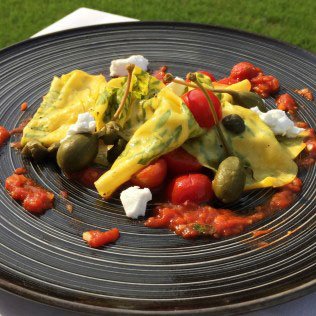 Elan-Open-Sheets-of-fresh-pasta-with-goat-cheese-capers-cherry-tomatoes